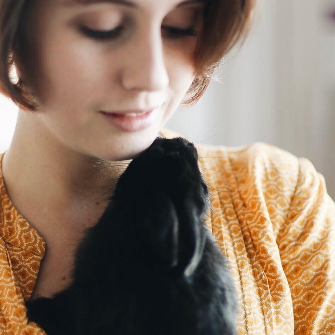 pet sitter holding rabbit